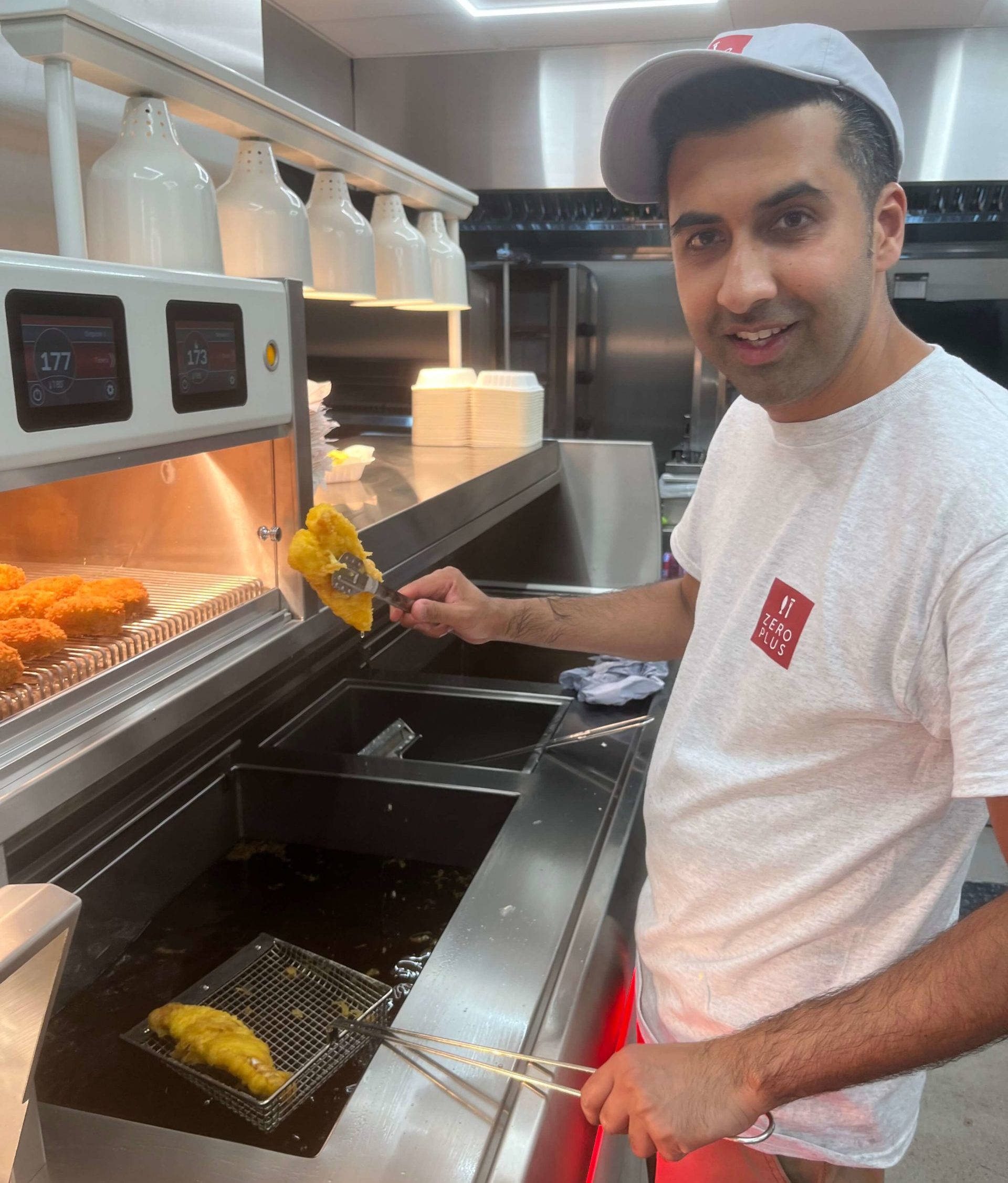 Zohaib Hussain, owner Zero Plus, frying on a Kiremko frying range