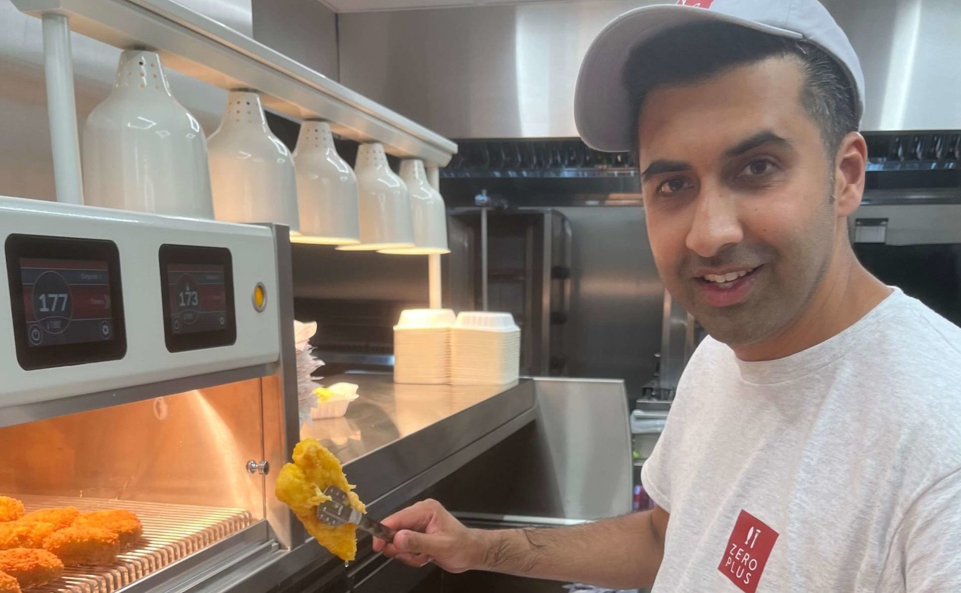 Zohaib Hussain, owner Zero Plus, frying on a Kiremko frying range